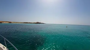 Water Edge Prints: Photography of small islands sanctuary in Oman near Muscat shot from a boat during spring sunny day