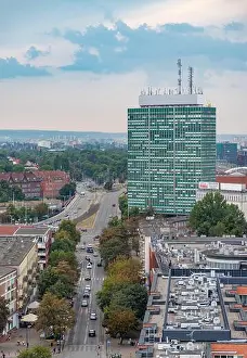 Polska Prints: A picture of the Zieleniak Building and the surrounding city of Gdansk on a stormy day