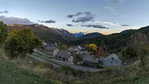 Huesca Prints: Picturesque drone view of small settlement with cottage houses in autumn sunset located in Fanlo in Huesca