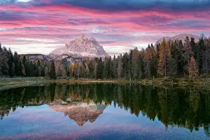 Picturesque landscape with famous lake Antorno (Lago di Antorno) in autumn Dolomites mountains. Incredible sunset in Italy Dolomites