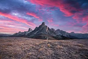 Picturesque landscape during incredible pink sunset in Italian Dolomites mountains. Passo Giau (Giau pass)