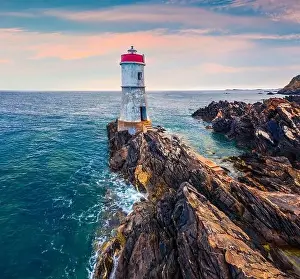Awakening Prints: Picturesque morning view from flying drone of di Capo Ferro Lighthose