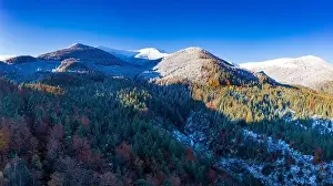 Smotrich Prints: Picturesque mountain landscapes of autumn with snow near the village of Dzembronya in Ukraine Carpathians mountains