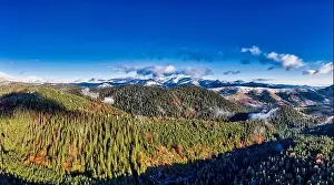 Smotrich Prints: Picturesque mountain landscapes of autumn with snow near the village of Dzembronya in Ukraine Carpathians mountains