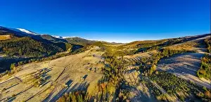 Picturesque mountain landscapes of autumn with snow near the village of Dzembronya in Ukraine Carpathians mountains