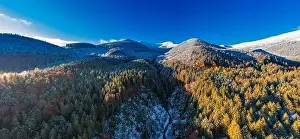 Smotrich Prints: Picturesque mountain landscapes of autumn with snow near the village of Dzembronya in Ukraine Carpathians mountains