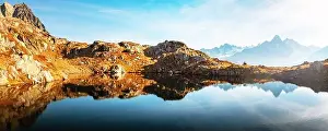 Picturesque panorama of Chesery lake (Lac De Cheserys) and snowy Monte Bianco mountains range on background, Chamonix, France Alps