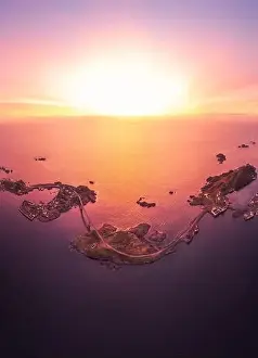 Boat Building Prints: Picturesque scenery from drone of snowy mountains and calm sea under cloudless sky in Norway in evening