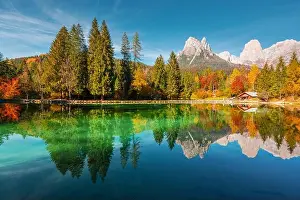Picturesque view at autumn Welsperg lake in Dolomite Alps. Canali Valley, Primiero San Martino di Castrozza, Province of Trento, Italy