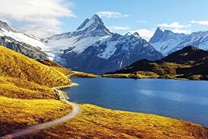 Images Dated 21st October 2018: Picturesque view on Bachalpsee lake in Swiss Alps mountains. Snowy peaks of Wetterhorn