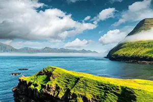 Picturesque view on green faroese islands mountains near village of Gjogv on the Eysturoy island, Faroe Islands, Denmark. Landscape photography