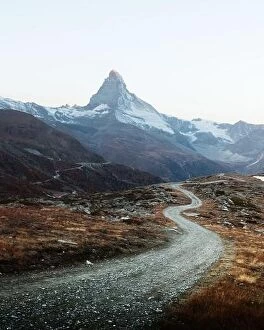 Images Dated 20th October 2018: Picturesque view of Matterhorn Cervino peak, dirt road and Stellisee lake in Swiss Alps