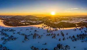 Picturesque winter panorama of mountain hills