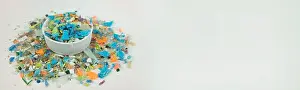 Chemicals Prints: A pile of microplastics inside a plastic bottle cap