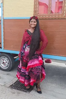 Gypsy Prints: Pilgrim outside a traditional gypsy caravan after the annual Roma procession with the Saint Sarah statue to the sea