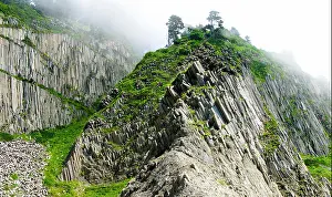 Cape Prints: Pillar Rocks of Stolbchatiy cape in Kunashir, Kuril islands, Russia