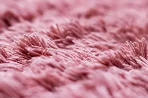 Fuzz Prints: Pink fabric bristles close up, background or texture
