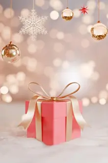 Bauble Prints: A pink gift box adorned with a ribbon