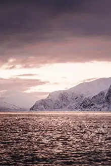 Brim Prints: Pink sky sunset over the Lyngen Alps and arctic ocean in northern Norway