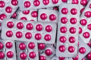 Migraine Prints: Pink tablets pill in blister pack