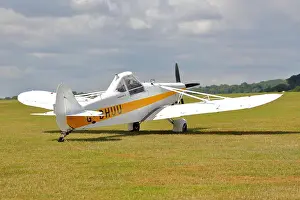 Spinning Prints: Piper Pawnee PA-25 D G-BHUU tug in action at Booker Airfield, Wycombe Airpark