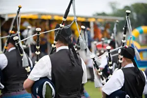 Fife Prints: Pipers piping in Pipe and Drum band at Markinch Highland Games