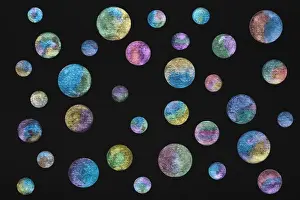 Droplets Prints: Planets painted with shining watercolor paints on black watercolor paper
