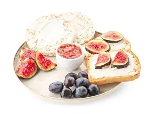 Puree Prints: Plate of tasty bruschettas, crispbreads, cream cheese and fruits on white background