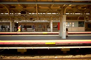 Hurry Prints: platform and train on a railway station