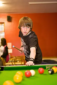 Entertain Prints: playing 8 ball pool in a youth centre
