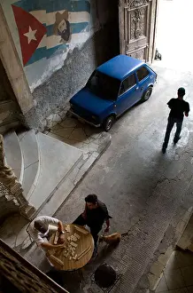 Cuban Prints: Playing domino inside the building filmed in 'Fresa y Chocolate'