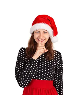 Claus Prints: Pleasant woman keeps finger on lips