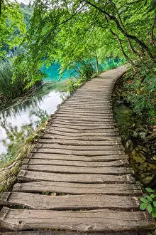 Stone Stream Prints: Plitvice, Croatia - Wooden walkway in Plitvice Lakes National Park on a bright summer day with crystal clear turquoise