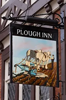 Pubs Prints: The Plough Inn; Painted metal Pub sign of horse ploughing field; Whitby a coastal town in North Yorkshire