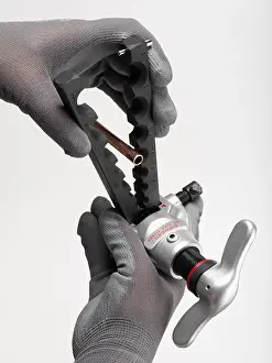 Tubes Prints: PLUMBER OPERATING AN ECCENTRIC COPPER PIPE FLARING TOOL