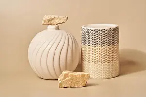 Refined Prints: The podium is a product presentation platform consisting of a porcelain object and natural stones
