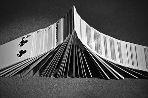 Poker playing cards turning face-up sequentially like dominoes. Casino and Card Magic maneuver