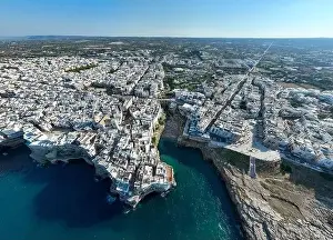 Puglia Prints: Polignano a Mare drone shot. Aerial view shot of Cala Paura in Puglia