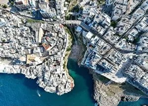 Polignano a Mare drone shot. Aerial view shot of Cala Paura in Puglia, Polignano. Most famous beach in South Italy