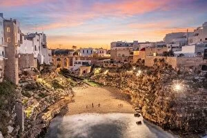 Images Dated 20th October 2022: Polignano a Mare, Italy overlooking the beach at dusk