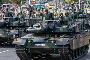 Servicemen Prints: Polish servicemen present K2 Black Panther tanks at Wislostrada in the centre of Warsaw