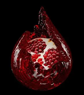 Appetite Prints: pomegranate in juice splashing in shape of drop with clipping path on a black background