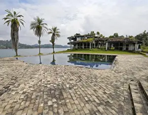 Colombian Prints: Pool and bombed-out ruins of drug lord Pablo Escobar's 'Finca Manuela' vacation home on the shore of