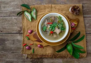 Dressing Prints: Pork spare rip Madan soup (Kra Dook Moo Tom Ma-Dun) in a white bowl