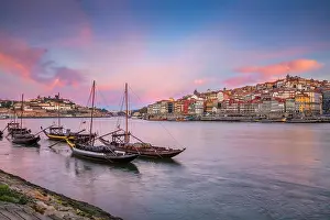 Porto, Portugal. Cityscape image of Porto, Portugal with reflection of the city in the Douro River during sunrise