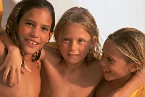 Young Girl Prints: Portrait 3 little girls smiling bare-chested wet hair