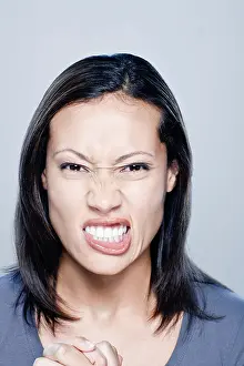 One Person Only Prints: Portrait of angry young woman, studio shot