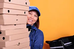 Bring Prints: Portrait of asian elderly delivery worker holding pizza boxes