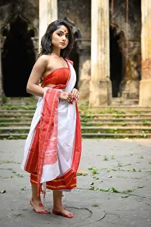 Saree Prints: Portrait of beautiful Bengali woman in red and white traditional ethnic saree