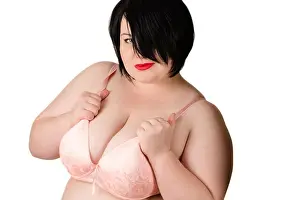 Seduction Prints: portrait beautiful fat woman with big breasts in beige bra